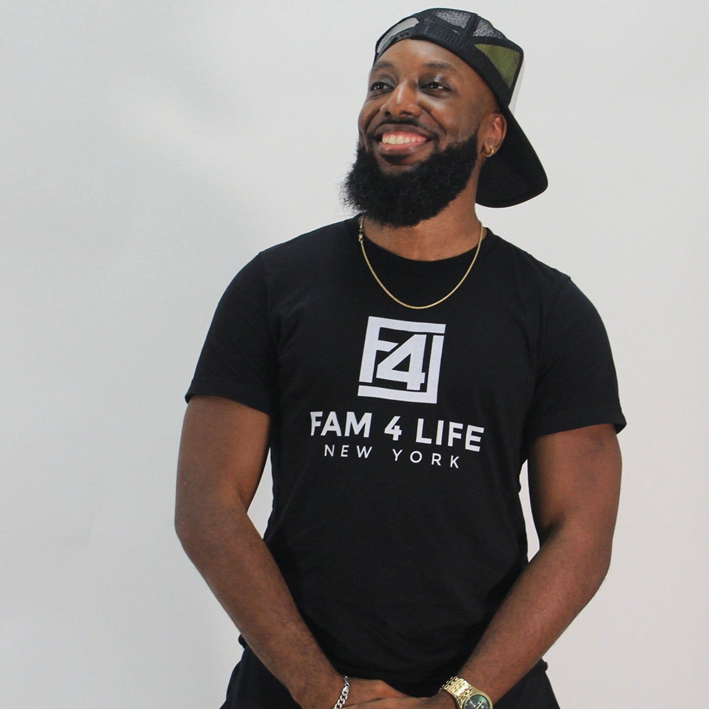 Man wearing the Big Staple Logo of Fam 4 Life.