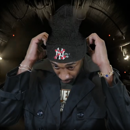 Gilbert Arenas wearing Black Fam 4 Life Beanie